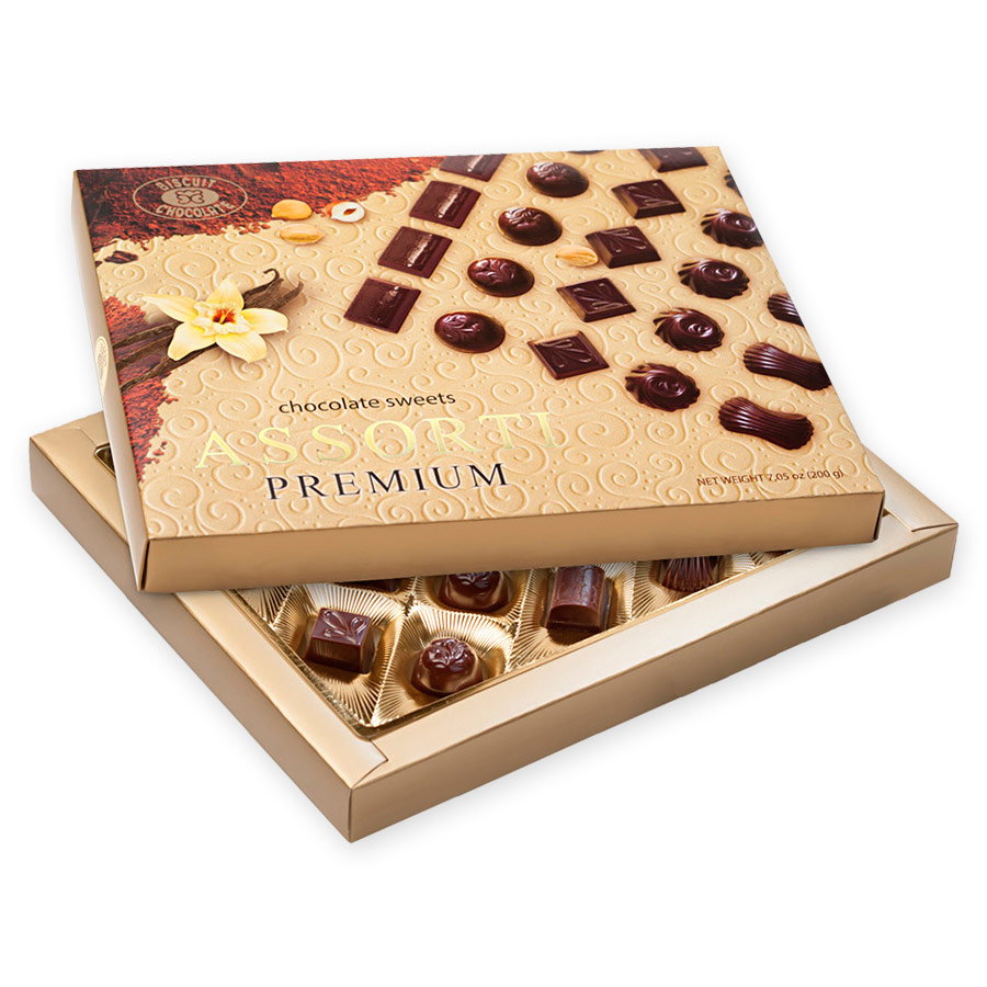 Chocolates surtidos (250 g.) — Chocolate con leche con sabores a nuez, caramelo y fruta Chocolates surtidos