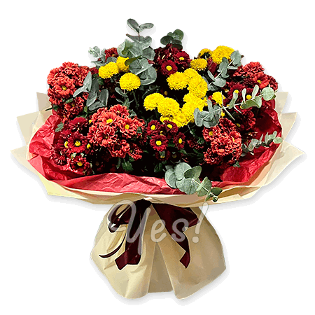 Bouquet de chrysanthèmes rouges et jaunes — composition sobre avec un accent de couleur marqué Bouquet de chrysanthèmes rouges et jaunes — composition sobre avec un accent de couleur marqué