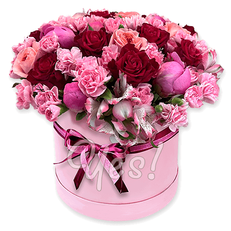 Roses, carnations, peonies and alstroemeria in a box